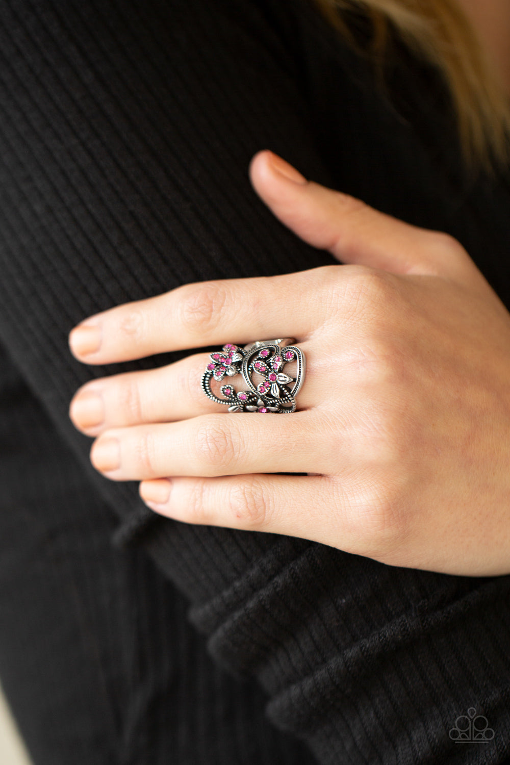 Bouquet Toss Pink Ring - Paparazzi Accessories  Dotted with dainty pink rhinestone centers, antiqued silver floral frames bloom across a studded backdrop for a sparkly seasonal look. Features a stretchy band for a flexible fit.  All Paparazzi Accessories are lead free and nickel free!  Sold as one individual ring.