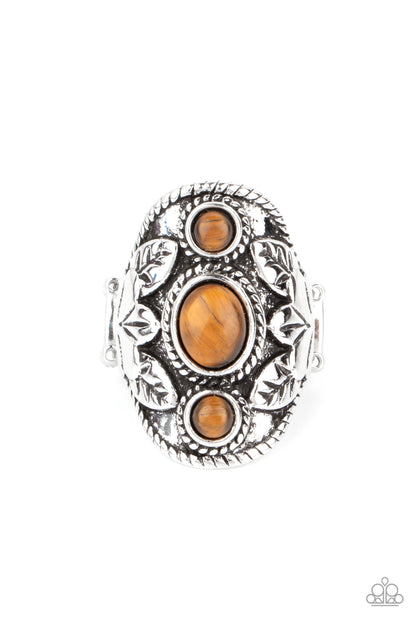 PALMS Up Brown Ring - Paparazzi Accessories.  Embossed in whimsical palm leaf patterns, a rustic silver frame is dotted in three tiger's eye stones for a mystical finish. Features a stretchy band for a flexible fit.  ﻿﻿﻿All Paparazzi Accessories are lead free and nickel free!  Sold as one individual ring.