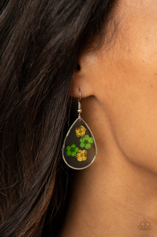 Perennial Prairie Yellow Flower Earring - Paparazzi Accessories  Dainty yellow and green flowers are encased in a glassy teardrop, creating a whimsical frame. Earring attaches to a standard fishhook fitting.  All Paparazzi Accessories are lead free and nickel free!  Sold as one pair of earrings.