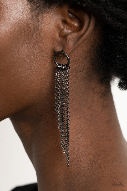 Divinely Dipping Black Earring - Paparazzi Accessories  Tapered gunmetal chains cascade from the bottom of a dainty gunmetal hoop, creating an angled fringe. Earring attaches to a standard post fitting.  All Paparazzi Accessories are lead free and nickel free!  Sold as one pair of post earrings.