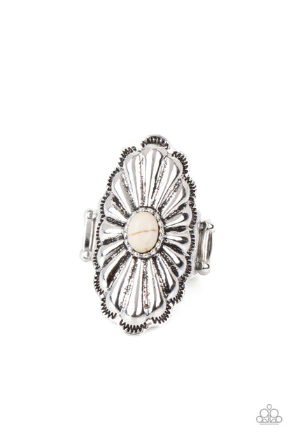 Cottage Couture - White Item #P4SE-WTXX-147XX Beveled silver petals fan out from the center of an oval white stone atop a scalloped silver frame, creating a whimsically rustic centerpiece atop the finger. Features a stretchy band for a flexible fit.  Sold as one individual ring.