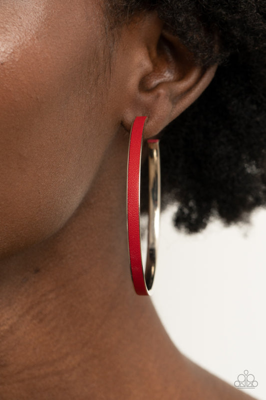 Fearless Flavor Red Hoop Earring - Paparazzi Accessories  A red leather lace is pressed along the indented spine of a silver hoop, creating a bold pop of color. Earring attaches to a standard post fitting. Hoop measures approximately 2 1/4" in diameter.  All Paparazzi Accessories are lead free and nickel free!  Sold as one pair of hoop earrings.
