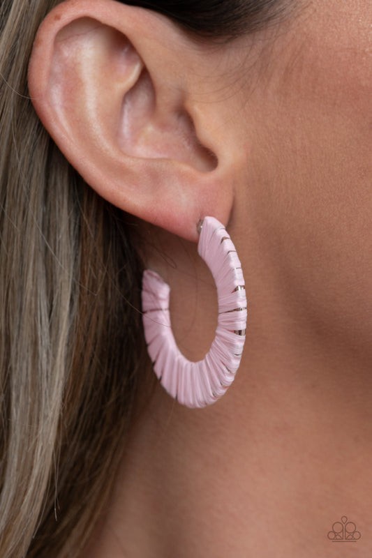 A Chance of RAINBOWS Pink Hoop Earring - Paparazzi Accessories.  Pink wicker-like cording wraps around a thick silver hoop, creating a flirty pop of color. Earring attaches to a standard post fitting. Hoop measures approximately 1 1/2" in diameter.  ﻿﻿﻿All Paparazzi Accessories are lead free and nickel free!  Sold as one pair of hoop earrings.