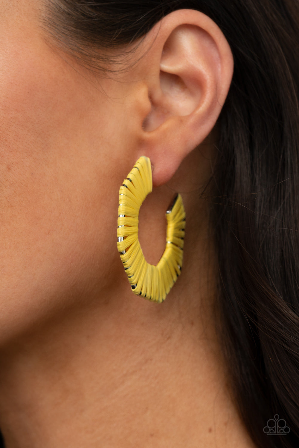 Fabulously Fiesta Yellow Hoop Earring - Paparazzi Accessories  Illuminating wicker-like cording is wrapped around a hexagonal hoop, creating a colorful pop of color. Earring attaches to a standard post fitting. Hoop measures approximately 2" in diameter.  All Paparazzi Accessories are lead free and nickel free!  Sold as one pair of hoop earrings.