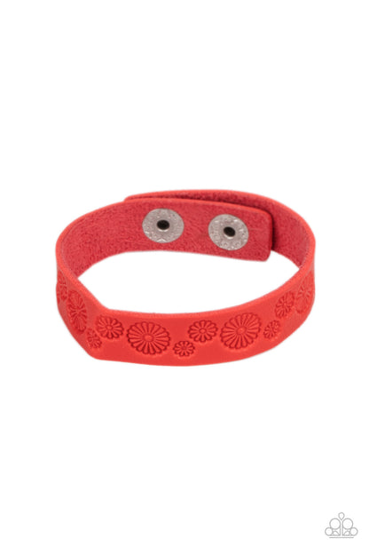 Follow The Wildflowers Red Wrap Bracelet - Paparazzi Accessories. Stamped in a whimsical daisy pattern, a dainty red leather band wraps around the wrist for a seasonal flair. Features an adjustable snap closure.  All Paparazzi Accessories are lead free and nickel free!  Sold as one individual bracelet.