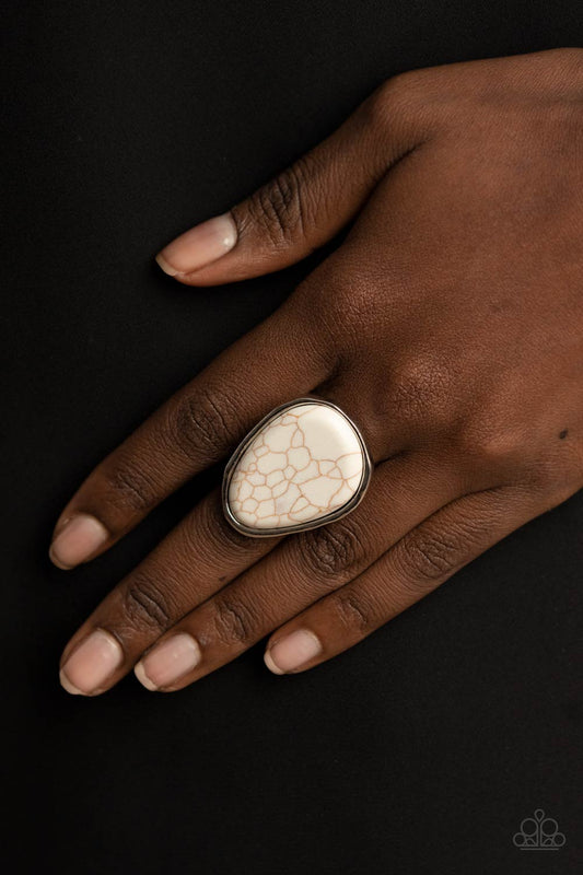 Marble Mecca White Ring - Paparazzi Accessories  Featuring a faux marble finish, an asymmetrical white stone is encased inside an imperfect silver frame for a simply seasonal look atop the finger. Features a stretchy band for a flexible fit.  Sold as one individual ring.