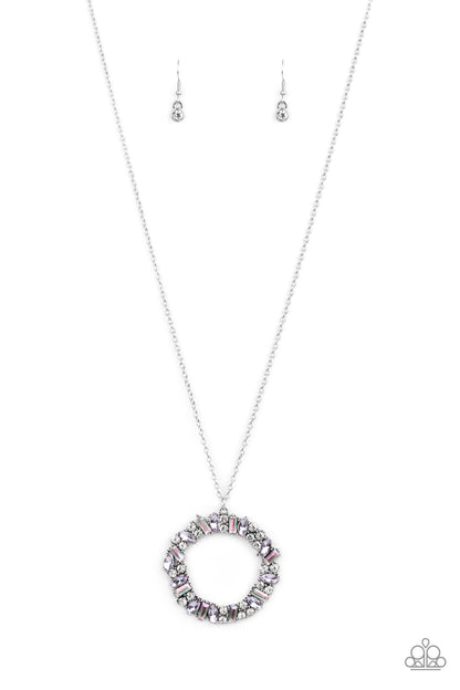 Wreathed in Wealth Purple Necklace - Paparazzi Accessories  Marquise cut purple rhinestones, classic white rhinestones, and iridescent emerald style rhinestones are encrusted along the front of a circular frame, creating an elegant wreath at the bottom of a lengthened silver chain. Features an adjustable clasp closure.  All Paparazzi Accessories are lead free and nickel free!  Sold as one individual necklace. Includes one pair of matching earrings.