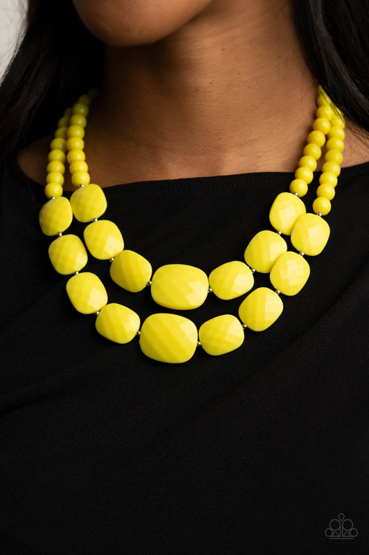 Resort Ready Yellow Necklace - Paparazzi Accessories  Featuring square facets, strands of shimmery Illuminating beads give way to an oversized collection of flattened Illuminating beads. Featuring faceted surfaces, the asymmetrical beads catch and reflect the light as they flawlessly layer below the collar. Features an adjustable clasp closure.  All Paparazzi Accessories are lead free and nickel free!  Sold as one individual necklace. Includes one pair of matching earrings.