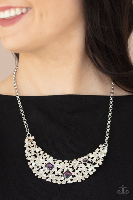 Fabulously Fragmented Purple Necklace - Paparazzi Accessories  Sporadically dotted in mismatched purple and white rhinestones, a smattering of fragmented silver frames coalesce into a bold half moon below the collar for an edgy fashion. Features an adjustable clasp closure.  Sold as one individual necklace. Includes one pair of matching earrings.