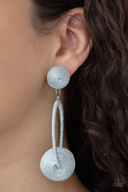 Social Sphere Silver Post Earring - Paparazzi Accessories  Shimmery silver thread wraps around an oversized bead that is fitted in place along the bottom of a matching threaded hoop. The glistening display links to the bottom of a matching silver threaded fitting, creating a dramatic lure. Earring attaches to a standard post fitting.  Sold as one pair of post earrings.