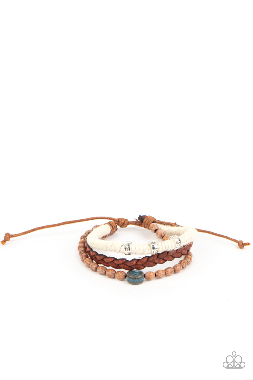 Terrarium Terrain Blue Urban Bracelet - Paparazzi Accessories  Featuring floral stamped accents and a colorful ceramic-like bead, strands of wooden beads, white twine, and braided leather layer around the wrist for an earthy look. Features an adjustable sliding knot closure.  All Paparazzi Accessories are lead free and nickel free!  Sold as one individual bracelet.