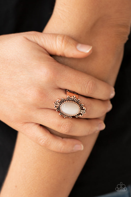 Can You SEER What I SEER Copper Ring - Paparazzi Accessories  A glowing cat's eye stone is pressed into the center of an ornately studded copper frame, creating a mystical pop of color atop the finger. Features a stretchy band for a flexible fit.  Sold as one individual ring.