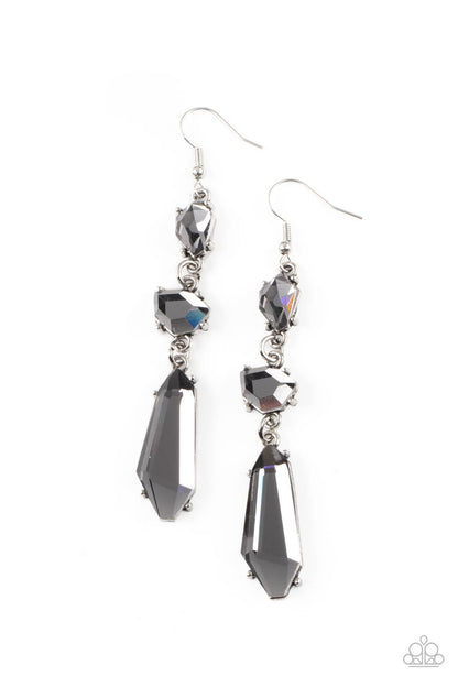 Sophisticated Smolder Silver Earring - Paparazzi Accessories  Featuring raw cuts, an asymmetrical collection of faceted smoky gems trickles from the ear, creating a smoldering chandelier. Earring attaches to a standard fishhook fitting.  All Paparazzi Accessories are lead free and nickel free!  Sold as one pair of earrings.