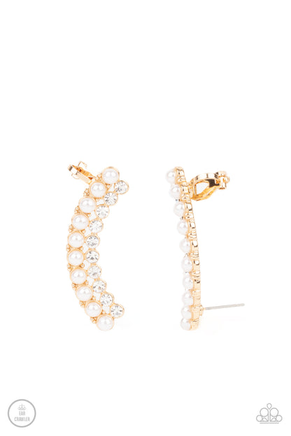 Doubled Down On Dazzle Gold Ear Crawler Earring - Paparazzi Accessories  Featuring classic gold fittings, two rows of dainty white pearls and glassy white rhinestones arch into a timeless statement piece. Earring attaches to a standard post earring. Features a clip-on fitting at the top for a secure fit.  Sold as one pair of ear crawlers.