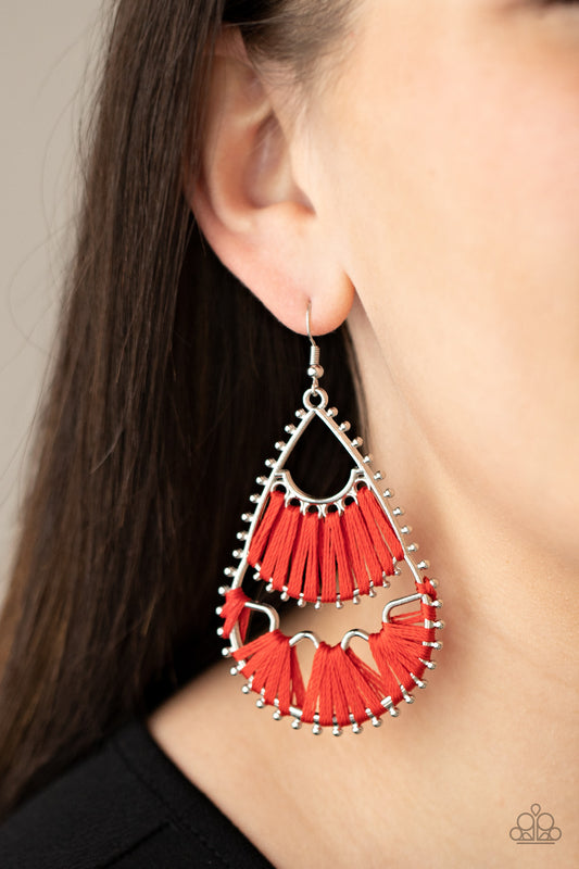Samba Scene Red Earring - Paparazzi Accessories  Three abstract silver fittings section off the inside of a pronged teardrop. Red thread is wrapped around the bar-like fittings, creating colorful loom-like accents. Earring attaches to a standard fishhook fitting.  All Paparazzi Accessories are lead free and nickel free!  Sold as one pair of earrings.