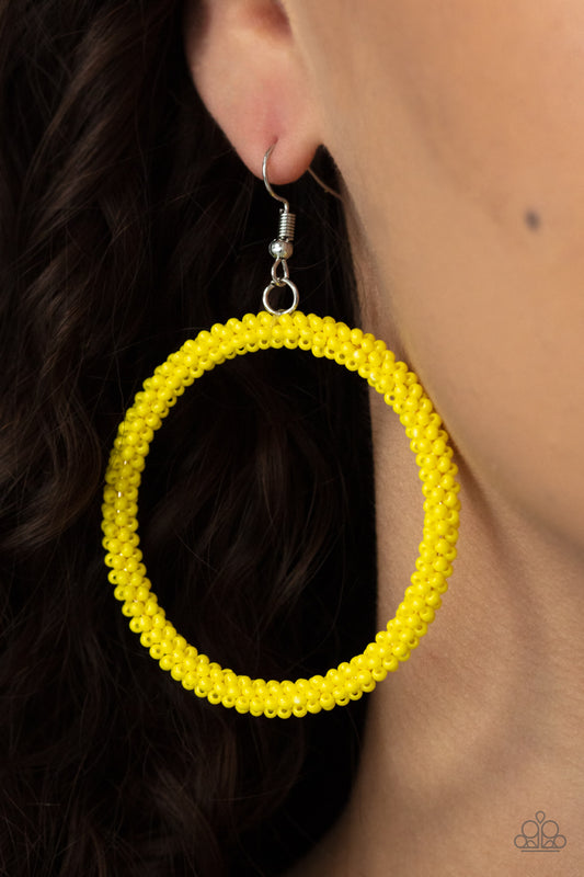 Beauty and the BEACH Yellow Earring - Paparazzi Accessories  A dainty strand of Illuminating seed beads wrap around a silver hoop, creating a bubbly hoop. Earring attaches to a standard fishhook fitting.  Sold as one pair of earrings.