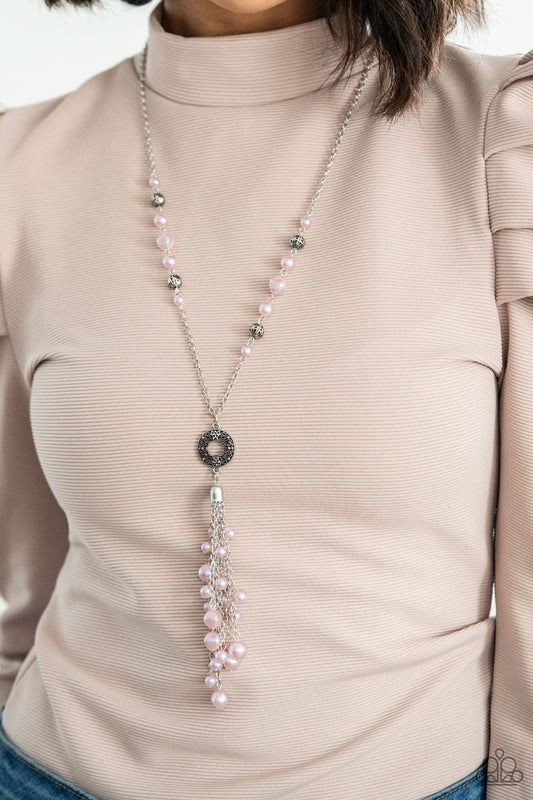 Tasseled Treasure Pink Necklace - Paparazzi Accessories  Dotted with sections of ornate silver beads and imperfect pink pearls, a lengthened silver chain gives way to a filigree studded pendant. Dotted with matching pearls, shiny silver chains join into a timelessly clustered tassel at the bottom of the refined pendant. Features an adjustable clasp closure.  ﻿All Paparazzi Accessories are lead free and nickel free!  Sold as one individual necklace. Includes one pair of matching earrings.