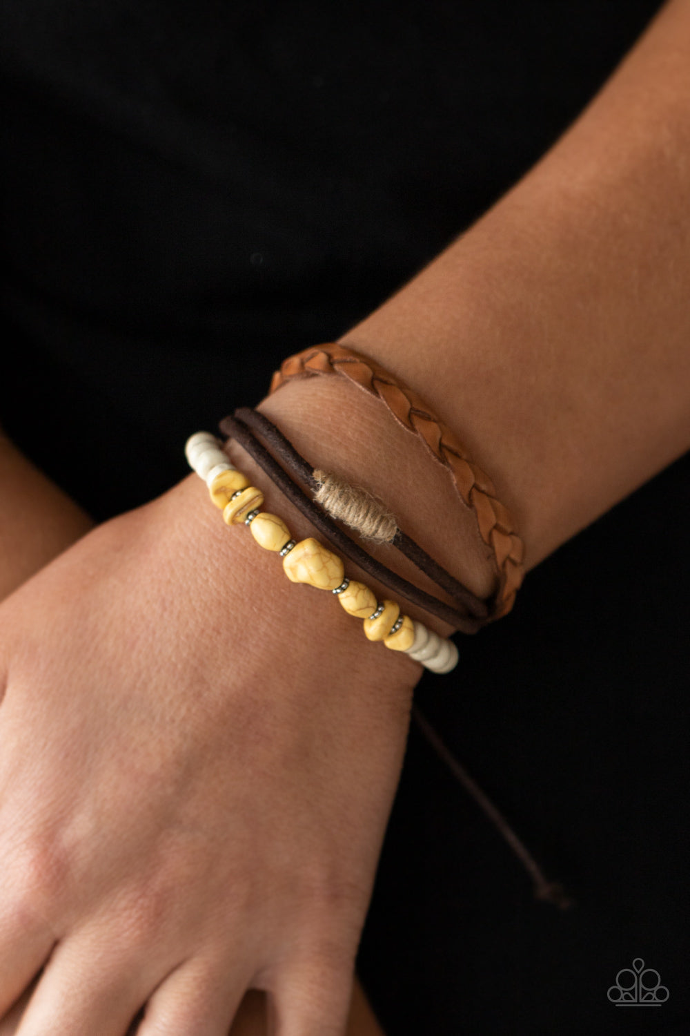 Far Out Wayfair Yellow Urban Bracelet - Paparazzi Accessories  Mismatched strands of brown suede, braided brown leather, and yellow stones and white wooden beads layer across the wrist for a colorful seasonal look. Features an adjustable sliding knot closure.  Sold as one individual bracelet.
