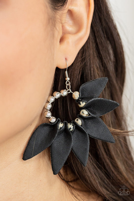 Flower Child Fever Black Earring - Paparazzi Accessories  Infused with a row of shiny silver beads, black leather petals are separated by black dotted white stones along a dainty silver hoop, creating a wild fringe. Earring attaches to a standard fishhook fitting.  ﻿All Paparazzi Accessories are lead free and nickel free!  Sold as one pair of earrings.