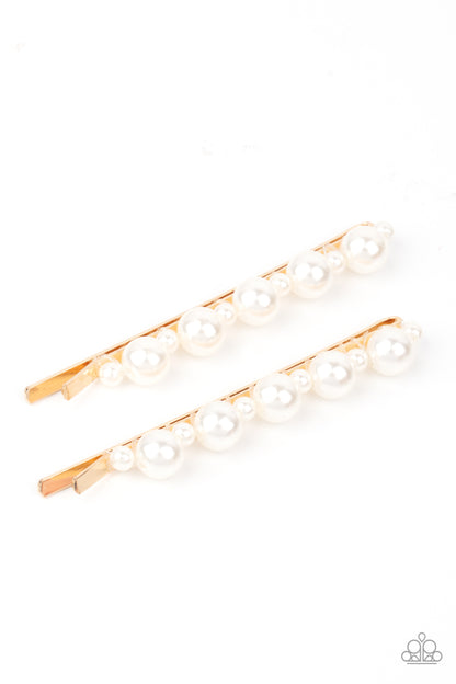 Put A Pin In It Gold Hair Clip - Paparazzi Accessories  Dainty and classic pearls alternate along a pair of gold bobby pins, creating a bubbly display.  Sold as one pair of decorative bobby pins.