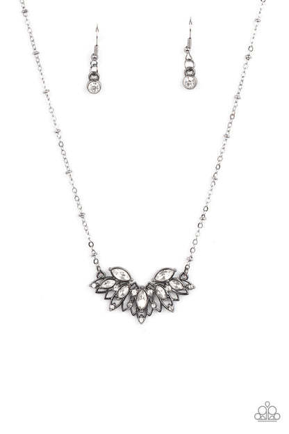 Deluxe Diadem Black Necklace - Paparazzi Accessories  Dotted in a dainty collection of classic round and regal marquise cut rhinestones, airy gunmetal petals fan out below the collar, creating a stunning pendant. Features an adjustable clasp closure.  All Paparazzi Accessories are lead free and nickel free!  Sold as one individual necklace. Includes one pair of matching earrings.