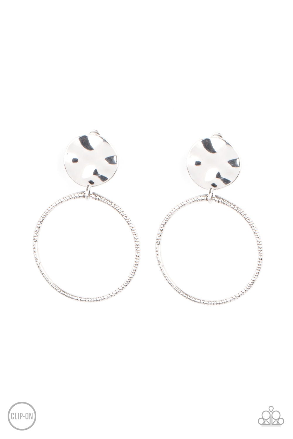 Undeniably Urban Silver Clip-On Earring - Paparazzi Accessories  A textured silver hoop attaches to a hammered silver disc, creating an edgy hoop. Earring attaches to a standard clip-on fitting.  All Paparazzi Accessories are lead free and nickel free!  Sold as one pair of clip-on earrings.
