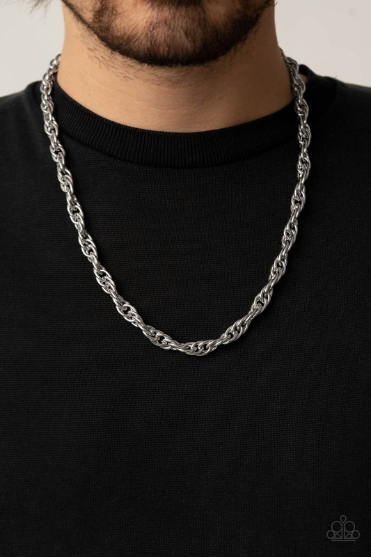 Extra Entrepreneur Silver Urban Necklace - Paparazzi Accessories. Double linked silver ovals spin into a bold silver chain below the collar, creating an intense industrial display. Features an adjustable clasp closure.  All Paparazzi Accessories are lead free and nickel free!  Sold as one individual necklace.  Get The Complete Look! Bracelet: "Executive Exclusive - Silver" (Sold Separately)