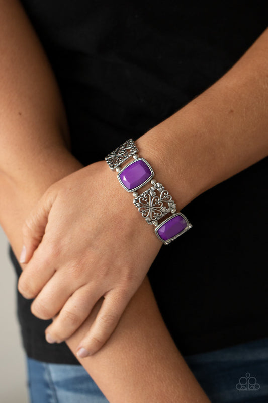 Colorful Coronation Purple Bracelet - Paparazzi Accessories  Infused with dainty silver heart accents, whimsically filled silver filigree frames and faceted Amethyst Orchid beads are threaded along stretchy bands around the wrist for a colorful flair.  All Paparazzi Accessories are lead free and nickel free!  Sold as one individual bracelet.
