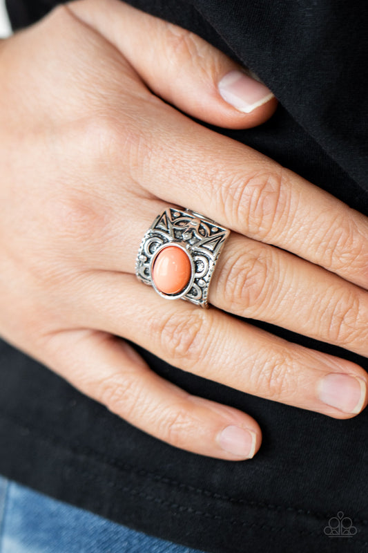 Bubbly Bonanza Orange Ring - Paparazzi Accessories  A bubbly Burnt Coral bead is pressed into the center of a thick silver frame embossed in a leafy geometric pattern, creating a colorfully whimsical centerpiece. Features a stretchy band for a flexible fit.  All Paparazzi Accessories are lead free and nickel free!  Sold as one individual ring.