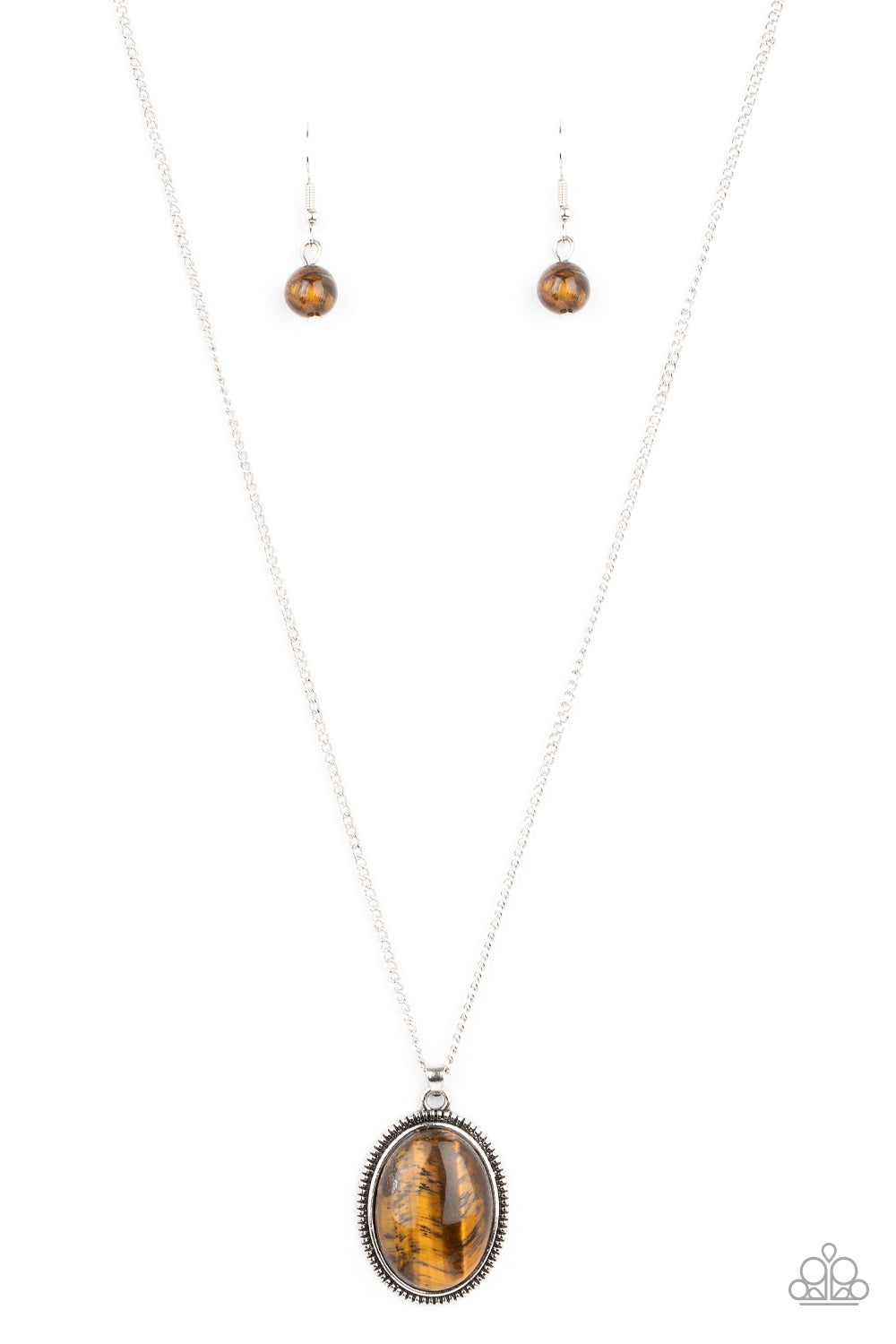 Tranquil Talisman Brown Necklace - Paparazzi Accessories. An oval tiger's eye stone is pressed into the center of a studded silver frame, creating a tranquil pendant below the collar. Features an adjustable clasp closure.  All Paparazzi Accessories are lead free and nickel free!  Sold as one individual necklace. Includes one pair of matching earrings.