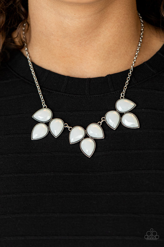 Prairie Fairytale White Necklace - Paparazzi Accessories  Trios of faceted dewy white teardrop beads encased in studded antiqued silver casings coalesce into leafy frames that delicately link into an ethereal fringe below the collar. Features an adjustable clasp closure.  All Paparazzi Accessories are lead free and nickel free!  Sold as one individual necklace. Includes one pair of matching earrings.