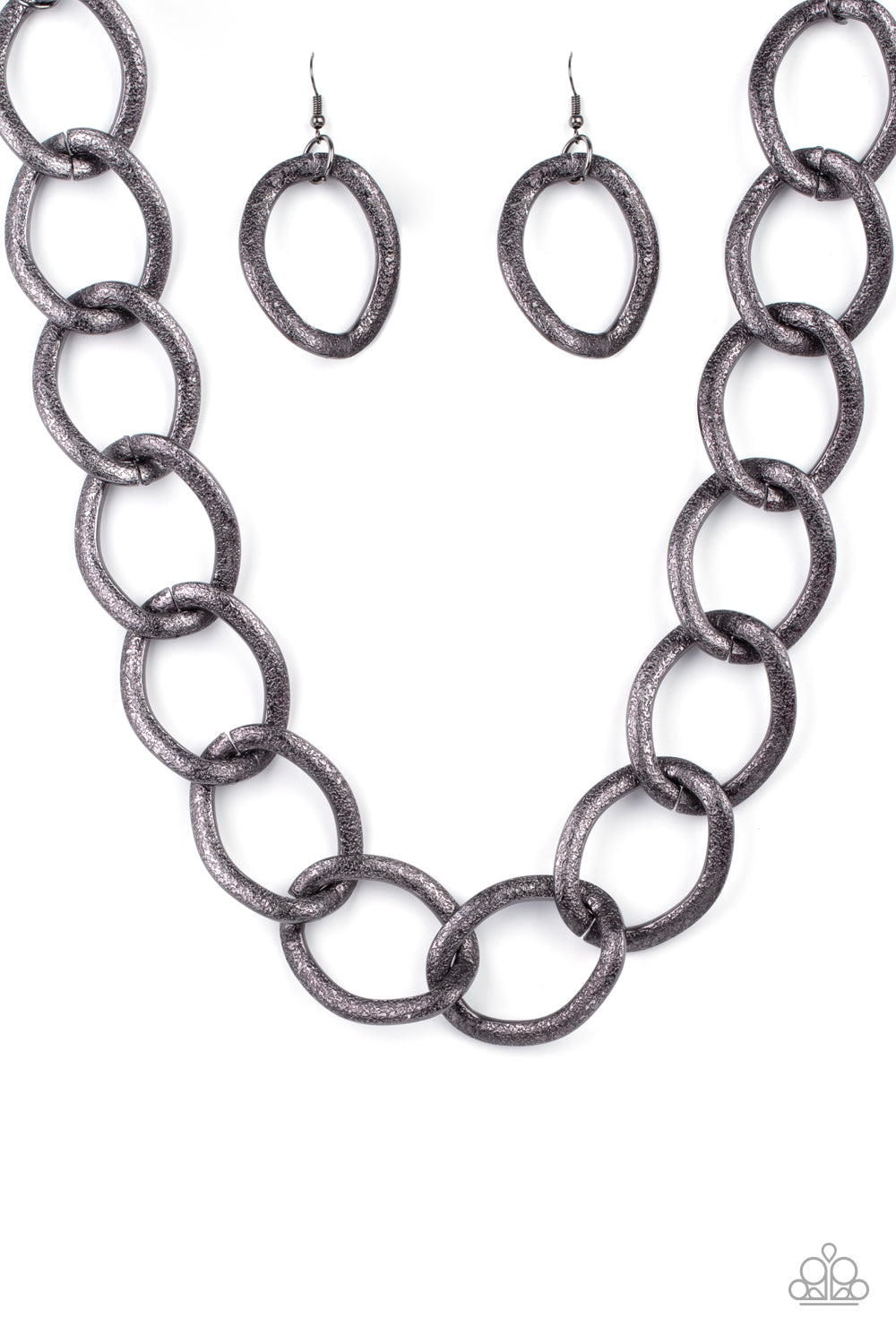 Industrial Intimidation Black Necklace - Paparazzi Accessories  Surprisingly lightweight, enormous hematite links create an intimidating statement as they circle around the collar. The contoured, textured links have a distinctly industrial vibe that demands a second look. Features an adjustable clasp closure.  All Paparazzi Accessories are lead free and nickel free!  Sold as one individual necklace. Includes one pair of matching earrings.