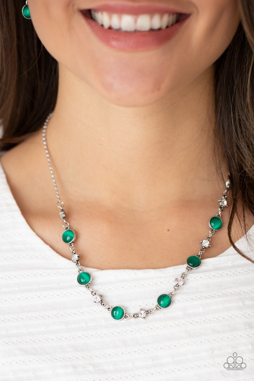Inner Illumination Green Necklace - Paparazzi Accessories  Encased in antiqued silver fittings, dainty white rhinestones and glowing Mint cat's eye stones delicately link below the collar for a timeless finish. Features an adjustable clasp closure.  Sold as one individual necklace. Includes one pair of matching earrings.  Get The Complete Look!  Bracelet: "Use Your ILLUMINATION - Green" (Sold Separately)
