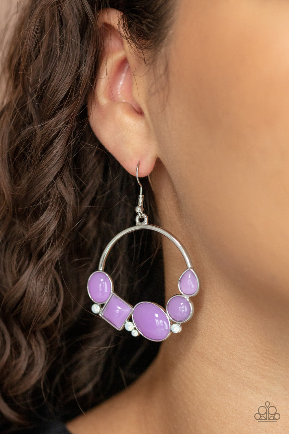 Beautifully Bubblicious Purple Earring - Paparazzi Accessories.  Dainty opalescent white rhinestones are sprinkled between dewy oval, square, and circular purple beads along the bottom of a silver hoop, creating a bubbly pop of color. Earring attaches to a standard fishhook fitting.  ﻿All Paparazzi Accessories are lead free and nickel free!  Sold as one pair of earrings.