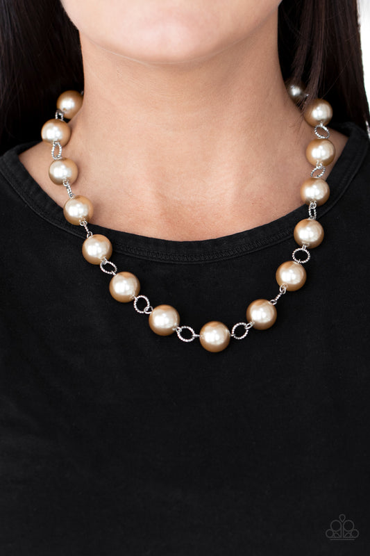 Ensconced in Elegance Brown Necklace - Paparazzi Accessories  Textured silver rings and oversized brown pearls delicately link into a bubbly statement piece below the collar. Features an adjustable clasp closure.  All Paparazzi Accessories are lead free and nickel free!  Sold as one individual necklace. Includes one pair of matching earrings.