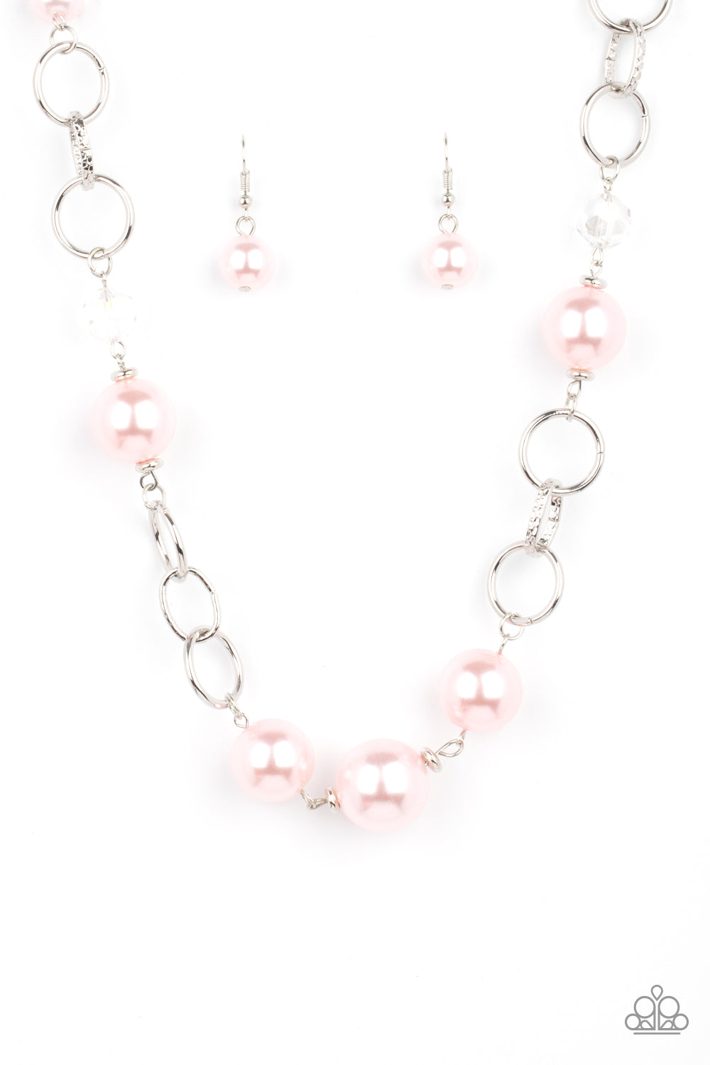 New Age Novelty Pink Pearl Necklace - Paparazzi Accessories  Sections of bold silver links, oversized pink pearls, and glassy crystal-like beads haphazardly connect below the collar, creating a dramatic display. Features an adjustable clasp closure.  Sold as one individual necklace. Includes one pair of matching earrings.