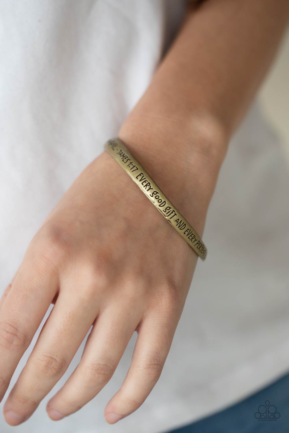 Perfect Present Brass Bangle Bracelet - Paparazzi Accessories  Featuring a subtle twist, a burnished brass bangle is engraved in the biblical passage, "Every good gift and every perfect gift is from above.--James 1:17," for an inspirational finish.  All Paparazzi Accessories are lead free and nickel free!  Sold as one individual bracelet.