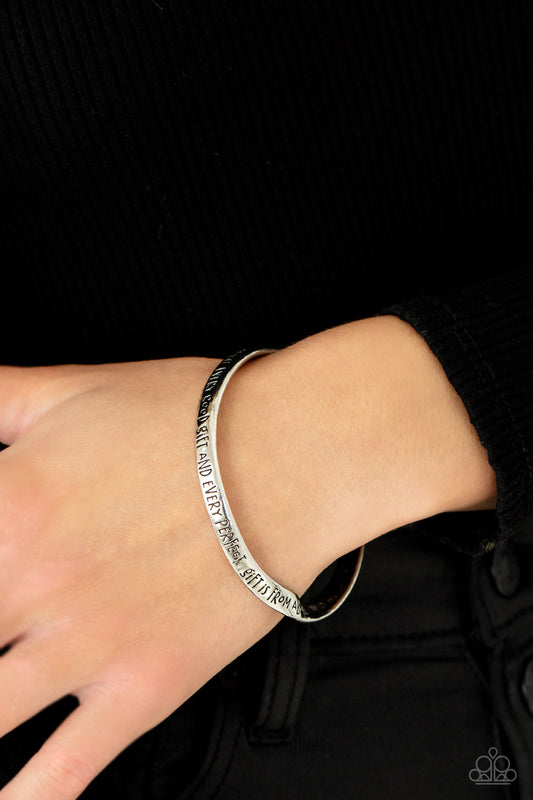 Perfect Present Silver Bangle Bracelet - Paparazzi Accessories  Featuring a subtle twist, a silver bangle is engraved in the biblical passage, "Every good gift and every perfect gift is from above.--James1:17," for an inspirational finish.  Sold as one individual bracelet.