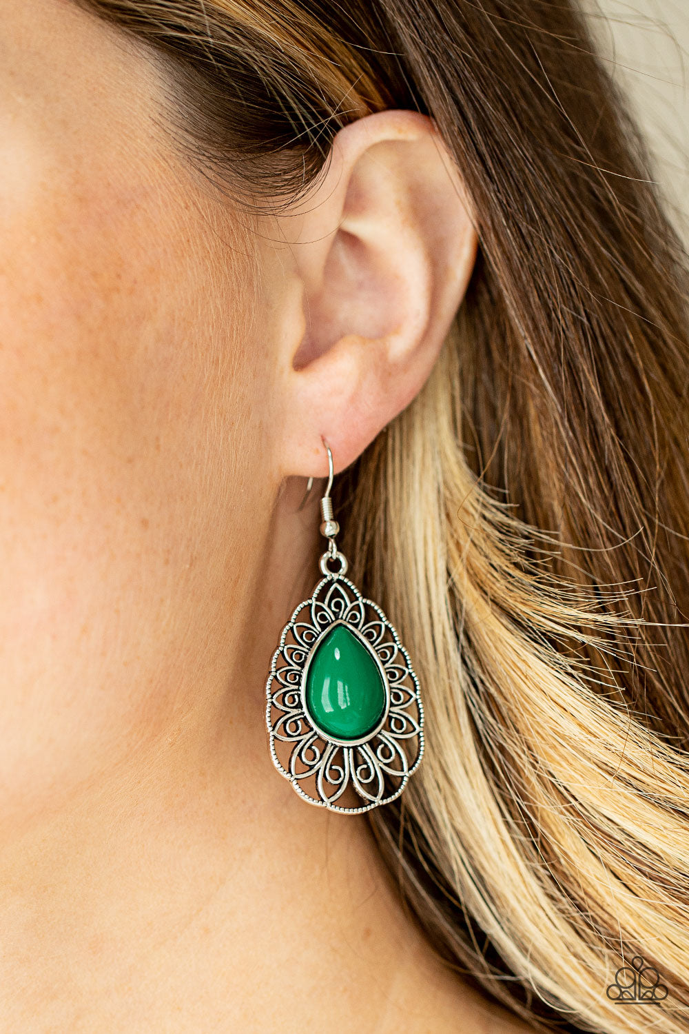 Dream STAYCATION Green Earring - Paparazzi Accessories A shiny Mint teardrop bead is pressed into the center of an airy silver teardrop frame radiating with ornate petals for a whimsical finesse. Earring attaches to a standard fishhook fitting.  All Paparazzi Accessories are lead free and nickel free!  Sold as one pair of earrings.
