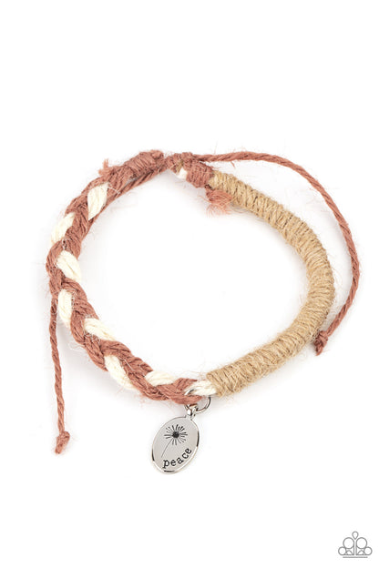 Perpetually Peaceful Urban Brown Bracelet - Paparazzi Accessories  Featuring a blooming dandelion, a simple silver disc is stamped in the word, "Peace," creating a whimsical charm on a homespun bracelet. Braided brown and white twine is balanced with wrapped brown twine for a natural feel encircling the wrist. Features an adjustable sliding knot closure.  All Paparazzi Accessories are lead free and nickel free!  Sold as one individual bracelet.