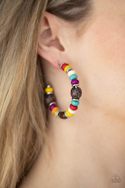 Definitely Down-To-Earth Multi Hoop Earring - Paparazzi Accessories  An earthy collection of multicolored stone beads, silver discs, and brown wooden beads are delicately threaded along a dainty wire, creating an artisan inspired hoop. Earring attaches to a standard post fitting. Hoop measures approximately 2" in diameter.  All Paparazzi Accessories are lead free and nickel free!  Sold as one pair of hoop earrings.