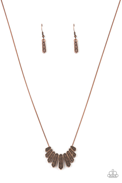 Monumental March Copper Necklace - Paparazzi Accessories  A row of copper obelisk-like monuments gradually decrease in size as they fan out across the collar. Delicately embossed with textured diamond shapes, they march along a dainty round copper chain. Features an adjustable clasp closure.  All Paparazzi Accessories are lead free and nickel free!  Sold as one individual necklace. Includes one pair of matching earrings.