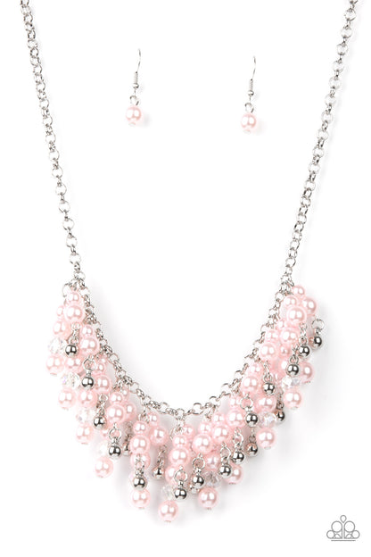 Champagne Dreams Pink Necklace - Paparazzi Accessories  A bubbly collection of pink pearls, silver beads, and sparkly crystal-like beads are threaded along metallic rods that trickle from the bottom of a shimmery silver chain, creating an elegantly effervescent fringe below the collar. Features an adjustable clasp closure.  All Paparazzi Accessories are lead free and nickel free!  Sold as one individual necklace. Includes one pair of matching earrings.