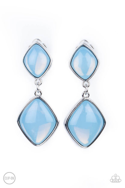 Double Dipping Diamonds Blue Clip-On Earring - Paparazzi Accessories  A pair of diamond shaped Cerulean opals are pressed into the centers of rustic silver frames that link into an ethereal lure. Earring attaches to a standard clip-on fitting.  All Paparazzi Accessories are lead free and nickel free!  Sold as one pair of clip-on earrings.