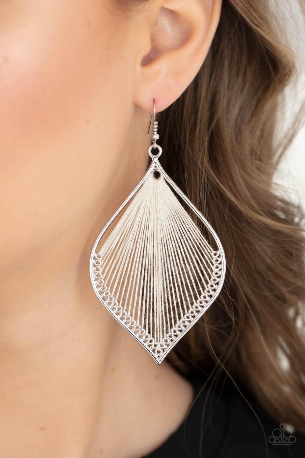 String Theory White Earring - Paparazzi Accessories  White string is threaded through small hoops inside a silver mandala-shaped frame for a vibrant artistic adornment. Earring attaches to a standard fishhook fitting.  All Paparazzi Accessories are lead free and nickel free!  Sold as one pair of earrings.