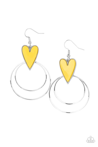 Happily Ever Hearts Yellow Earring - Paparazzi Accessories  Dainty silver hoops attach to the bottom of a playful Illuminating heart frame, creating a flirtatious pop of color. Earring attaches to a standard fishhook fitting.  All Paparazzi Accessories are lead free and nickel free!  Sold as one pair of earrings.
