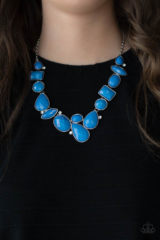 Mystical Mirage Blue Necklace- Paparazzi Accessories  Featuring the vibrant hue of French Blue, mismatched teardrop, rectangular, and round beaded frames delicately link below the collar. Hints of glassy white rhinestones are scattered throughout the display, adding a dash of refinement to the colorful statement piece. Features an adjustable clasp closure.  Sold as one individual necklace. Includes one pair of matching earrings.