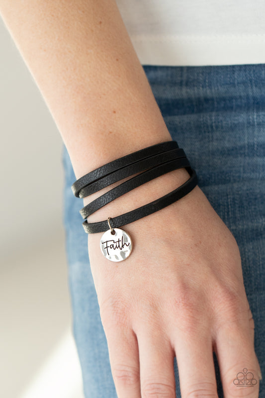 Wonderfully Worded Black Wrap Bracelet - Paparazzi Accessories  A hammered silver disc stamped in the word, "Faith" is threaded on a lengthened black leather cord that triple wraps around the wrist, creating a message of hope. Features an adjustable clasp closure.  All Paparazzi Accessories are lead free and nickel free!   Sold as one individual bracelet.