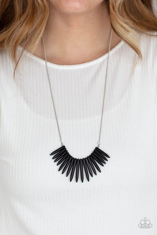 Exotic Edge Black Necklace - Paparazzi Accessories  A daring fringe of black stone spikes in gradually decreasing sizes flares out below the collar for an exotic and edgy effect. Features an adjustable clasp closure.  All Paparazzi Accessories are lead free and nickel free!  Sold as one individual necklace. Includes one pair of matching earrings.