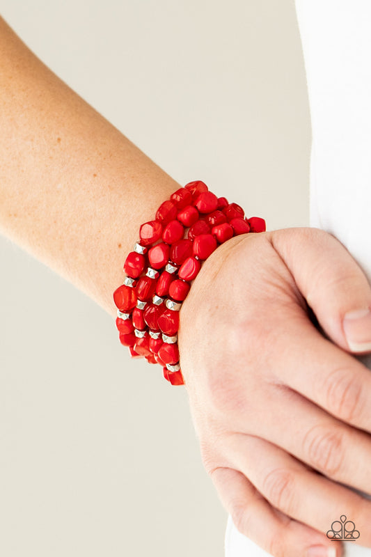 Nice GLOWING! Red Bracelet - Paparazzi Accessories  Bright red irregular shaped beads in varying opacities, accented with shining faceted silver beads are threaded along stretchy bands and stack up the wrist for a glowing display.  Sold as one individual bracelet.